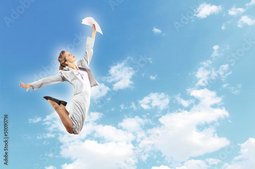 Photo: Image of jumping businesswoman Image of jumping businesswoman