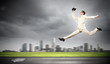 Photo: Businessman running on the road Businessman running on the road