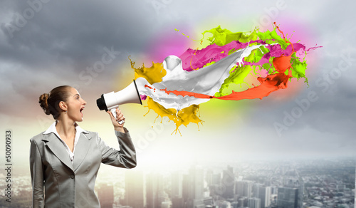 Photo: businesswoman with megaphone businesswoman with megaphone