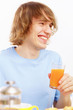 Young man drinking juice