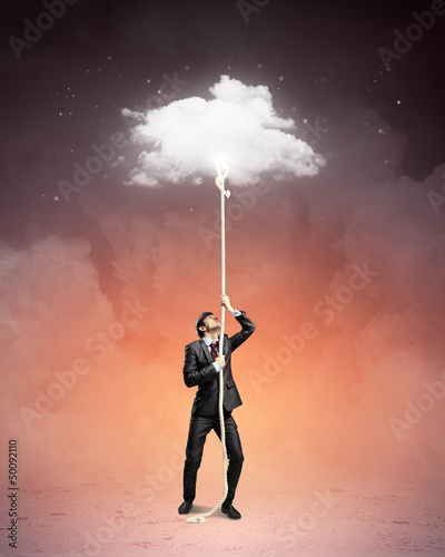 Photo: Image of businessman climbing rope Image of businessman climbing rope