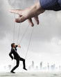 Business man marionette