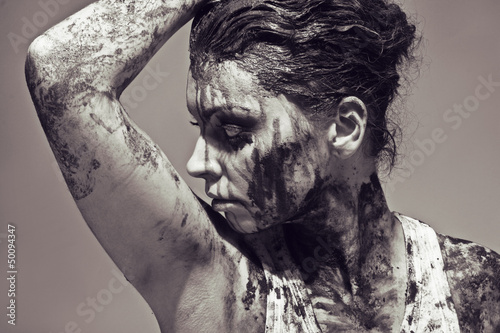 Photo: face and hands covered in mud face and hands covered in mud