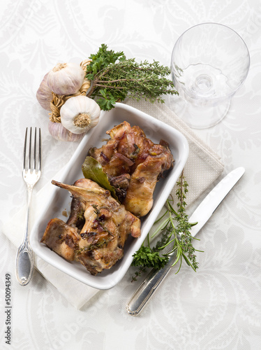 Photo: roasted rabbit with herbs and garlic roasted rabbit with herbs and garlic