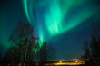 Northern Lights over City