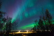 Northern Lights over City