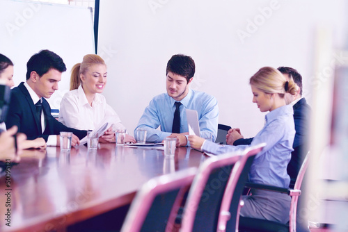 Photo: business people in a meeting at office business people in a meeting at office