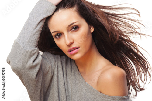 Photo: Beautiful brunette woman intense close up portrait Beautiful brunette woman intense close up portrait