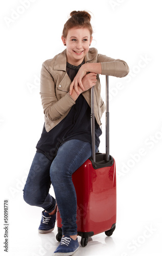 Photo: young girl with suitcase on white young girl with suitcase on white