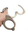 Man hand with handcuffs isolated on white background
