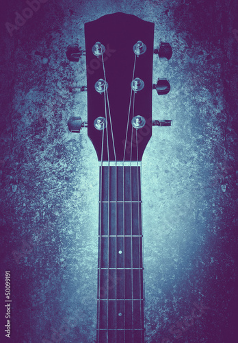 Photo: guitar neck on blue texture guitar neck on blue texture