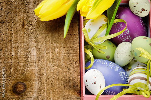 Photo: Colorful Easter eggs in festive setting Colorful Easter eggs in festive setting