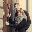 Man and Woman in front of Home Main Entrance