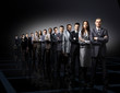 business team formed of young businessmen standing