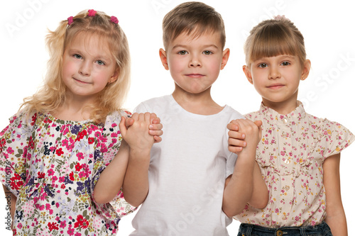 Photo: Three serious children Three serious children