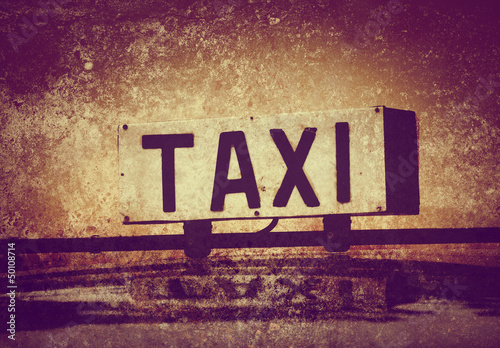 Photo: grunge taxi sign grunge taxi sign