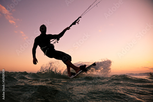 Photo: Kite boarding. Kitesurf freestyle Kite boarding. Kitesurf freestyle