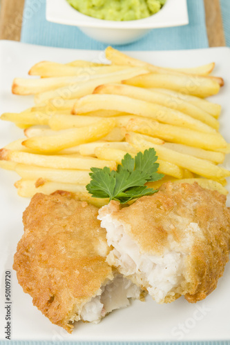 Photo: Fish & Chips - Battered fried cod fillet, chips and mushy peas. Fish & Chips - Battered fried cod fillet, chips and mushy peas.