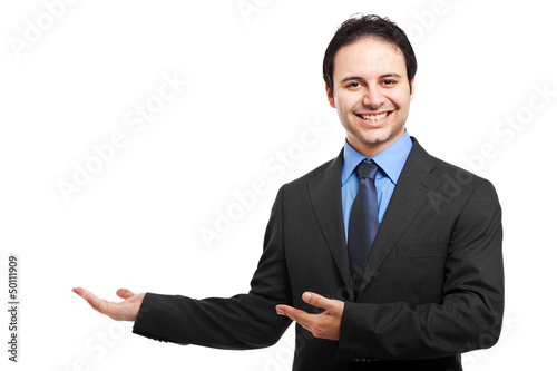Photo: Mature businessman presenting something that you can add then Mature businessman presenting something that you can add then