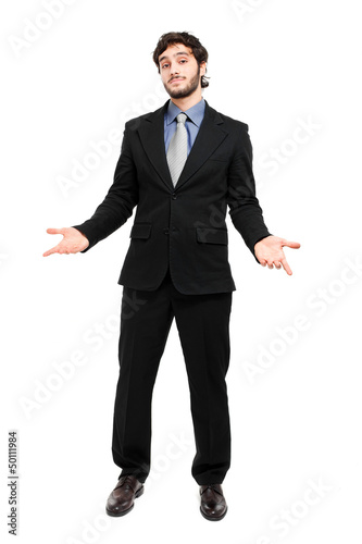 Photo: Approachable young business man with open arms isolated Approachable young business man with open arms isolated