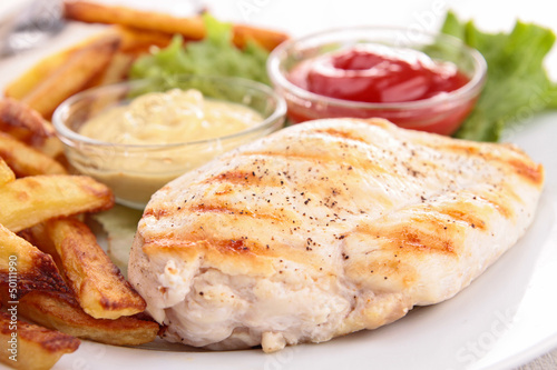 Photo: grilled meat with vegetable, and french fries grilled meat with vegetable, and french fries