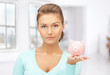 lovely woman with piggy bank