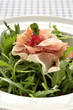 Photo: Rocket salad with parma ham and pomegranite seeds Rocket salad with parma ham and pomegranite seeds