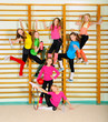 Active sporty girls in gym
