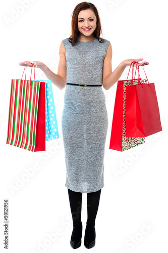 Photo: Portrait of a young shopaholic woman Portrait of a young shopaholic woman