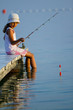 Fishing - girl  fishing on the pier