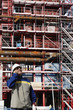 building engineer in front of factory construction