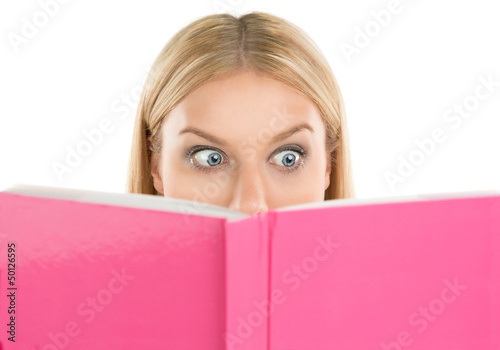 Photo: Young woman reading book isolated on white background Young woman reading book isolated on white background
