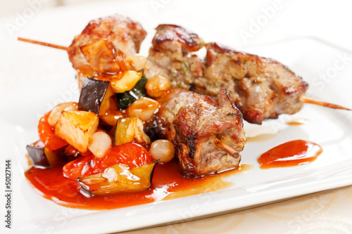 Photo: meat kebab with vegetables meat kebab with vegetables