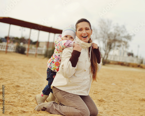 Photo: pregnant mother with baby daughter pregnant mother with baby daughter
