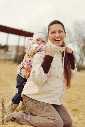Photo: pregnant mother with baby daughter pregnant mother with baby daughter
