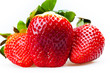 three strawberries isolated on white background