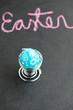 Foto: Blue easter egg shaped candle and text Blue easter egg shaped candle and text