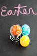 Foto: Colorful Easter egg shaped candles and text Colorful Easter egg shaped candles and text