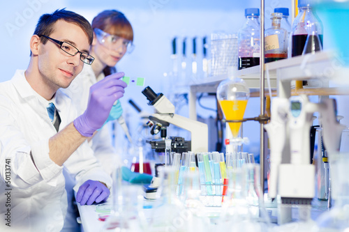 Photo: Health care professionals in lab. Health care professionals in lab.