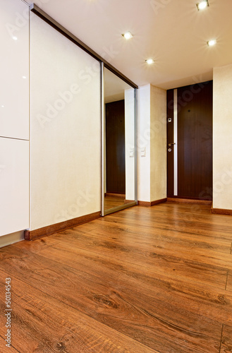 Photo: Modern minimalism style corridor interior with sliding-door mirr Modern minimalism style corridor interior with sliding-door mirr