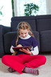 Photo: young girl with tablet young girl with tablet
