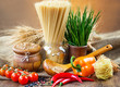 The composition of the pasta and vegetables on background