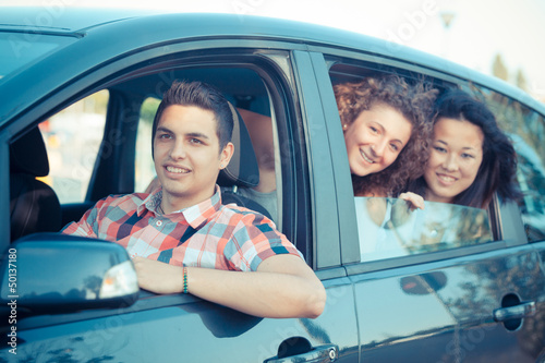 Photo: Boys and Girls in a Car Leaving for Vacation Boys and Girls in a Car Leaving for Vacation