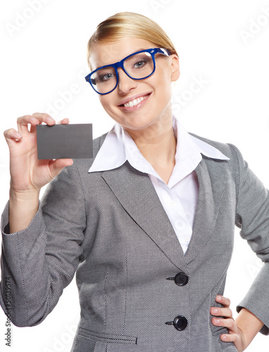 Photo: Businesswoman holding credit card. Isolated on white Businesswoman holding credit card. Isolated on white