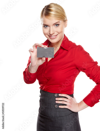Photo: Businesswoman holding credit card. Isolated on white Businesswoman holding credit card. Isolated on white