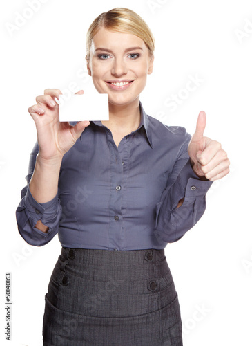 Photo: Businesswoman holding credit card. Isolated on white Businesswoman holding credit card. Isolated on white