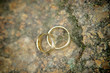 Photo: Golden Wedding Rings on a Stone Golden Wedding Rings on a Stone