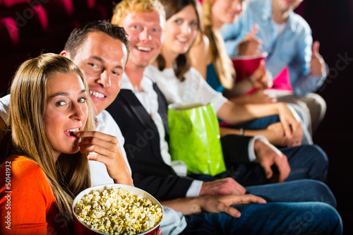 Photo: People see a movie in the cinema and have fun People see a movie in the cinema and have fun