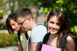 Outdoor portrait of three smiling students