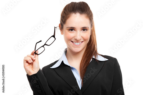 Photo: Young businesswoman holding her glasses Young businesswoman holding her glasses